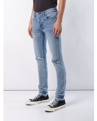 hellblaue Jeans mit Destroyed-Effekten von Ksubi