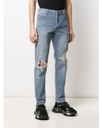 hellblaue Jeans mit Destroyed-Effekten von Balmain