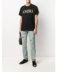 hellblaue Jeans mit Destroyed-Effekten von Amiri