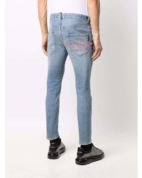 hellblaue Jeans mit Destroyed-Effekten von Philipp Plein