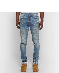 hellblaue Jeans mit Destroyed-Effekten von Amiri