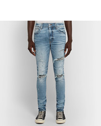 hellblaue Jeans mit Destroyed-Effekten von Amiri