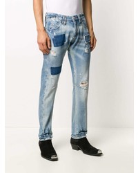 hellblaue Jeans mit Destroyed-Effekten von Philipp Plein