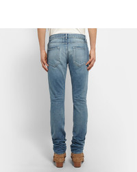 hellblaue Jeans mit Destroyed-Effekten von Saint Laurent