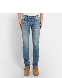 hellblaue Jeans mit Destroyed-Effekten von Saint Laurent