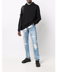 hellblaue Jeans mit Destroyed-Effekten von Evisu