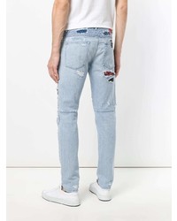 hellblaue Jeans mit Destroyed-Effekten von Marcelo Burlon County of Milan