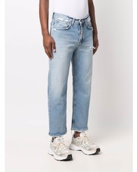 hellblaue Jeans mit Destroyed-Effekten von Haikure