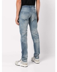 hellblaue Jeans mit Destroyed-Effekten von John Elliott