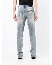 hellblaue Jeans mit Destroyed-Effekten von Ksubi