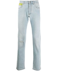 hellblaue Jeans mit Destroyed-Effekten von Versace