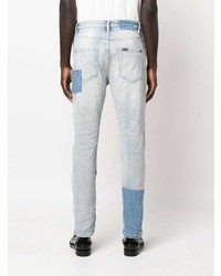 hellblaue Jeans mit Destroyed-Effekten von Ksubi