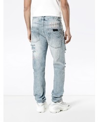 hellblaue Jeans mit Destroyed-Effekten von Ksubi