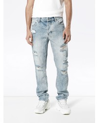 hellblaue Jeans mit Destroyed-Effekten von Ksubi