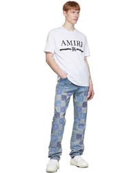 hellblaue Jeans mit Flicken von Amiri