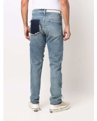 hellblaue Jeans mit Flicken von VAL KRISTOPHE