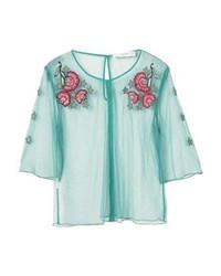 hellblaue Kurzarmbluse mit Blumenmuster von Mango