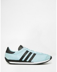 hellblaue Leder Turnschuhe von adidas