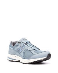 hellblaue Sportschuhe von New Balance