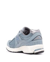 hellblaue Sportschuhe von New Balance