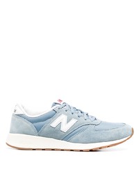 hellblaue Sportschuhe von New Balance