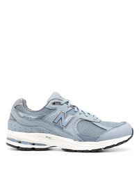 hellblaue Sportschuhe von New Balance