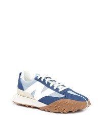 hellblaue Sportschuhe von New Balance