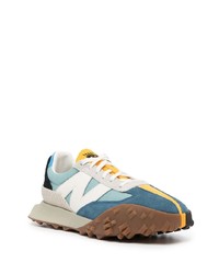 hellblaue Sportschuhe von New Balance