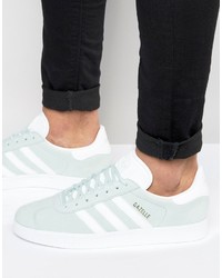 hellblaue Turnschuhe von adidas