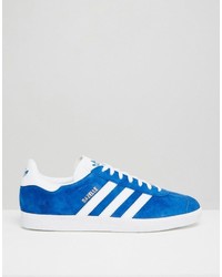 hellblaue Turnschuhe von adidas