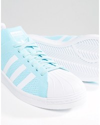 hellblaue Turnschuhe von adidas