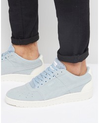 hellblaue Turnschuhe von Puma