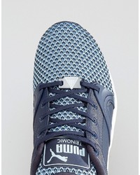 hellblaue Turnschuhe von Puma