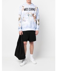 hellblauer bedruckter Pullover mit einem Kapuze von Moschino