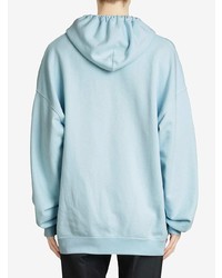 hellblauer bestickter Pullover mit einem Kapuze von Burberry