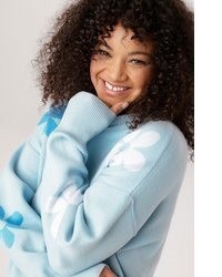 hellblauer Pullover mit Blumenmuster von Aniston PLUS