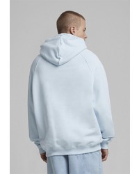 hellblauer Pullover mit einem Kapuze von PEQUS