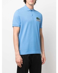 hellblaues bedrucktes Polohemd von Lacoste