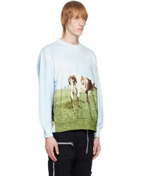 hellblaues bedrucktes Sweatshirt von Undercover