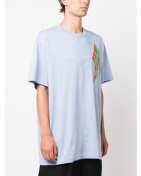 hellblaues bedrucktes T-Shirt mit einem Rundhalsausschnitt von Comme Des Garcons Homme Plus