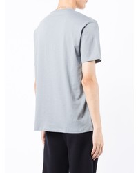 hellblaues bedrucktes T-Shirt mit einem Rundhalsausschnitt von Armani Exchange