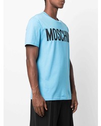 hellblaues bedrucktes T-Shirt mit einem Rundhalsausschnitt von Moschino