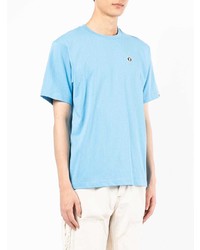 hellblaues T-Shirt mit einem Rundhalsausschnitt von AAPE BY A BATHING APE