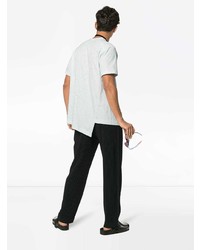 hellblaues T-Shirt mit einem Rundhalsausschnitt von Comme Des Garcons Homme Plus