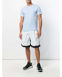 hellblaues T-Shirt mit einem Rundhalsausschnitt von Comme Des Garcons Homme Plus