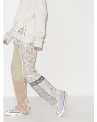 hellviolette hohe Sneakers aus Segeltuch von Converse
