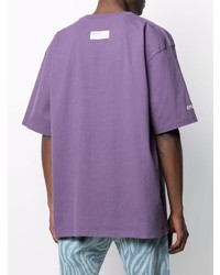 hellviolettes bedrucktes T-Shirt mit einem Rundhalsausschnitt von Heron Preston