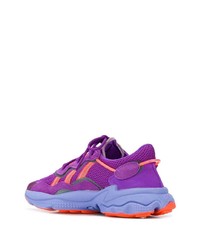 lila Sportschuhe von adidas