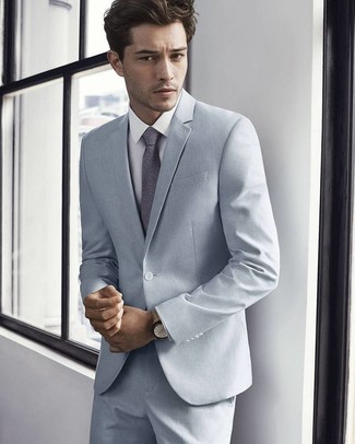 Beige Lederuhr kombinieren – 490 Herren Outfits: Arbeitsreiche Tage verlangen nach einem einfachen, aber dennoch stylischen Outfit, wie zum Beispiel ein grauer Anzug und eine beige Lederuhr.