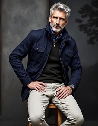 schwarzer Pullover mit einem Reißverschluss am Kragen von maier sports